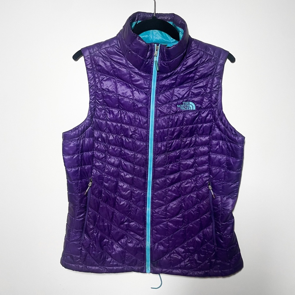 The North Face purple and blue zip up vest